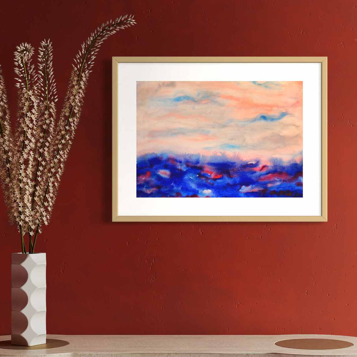 April Morning blue, peach framed horizon watercolor on deep rust red wall above table, closeup