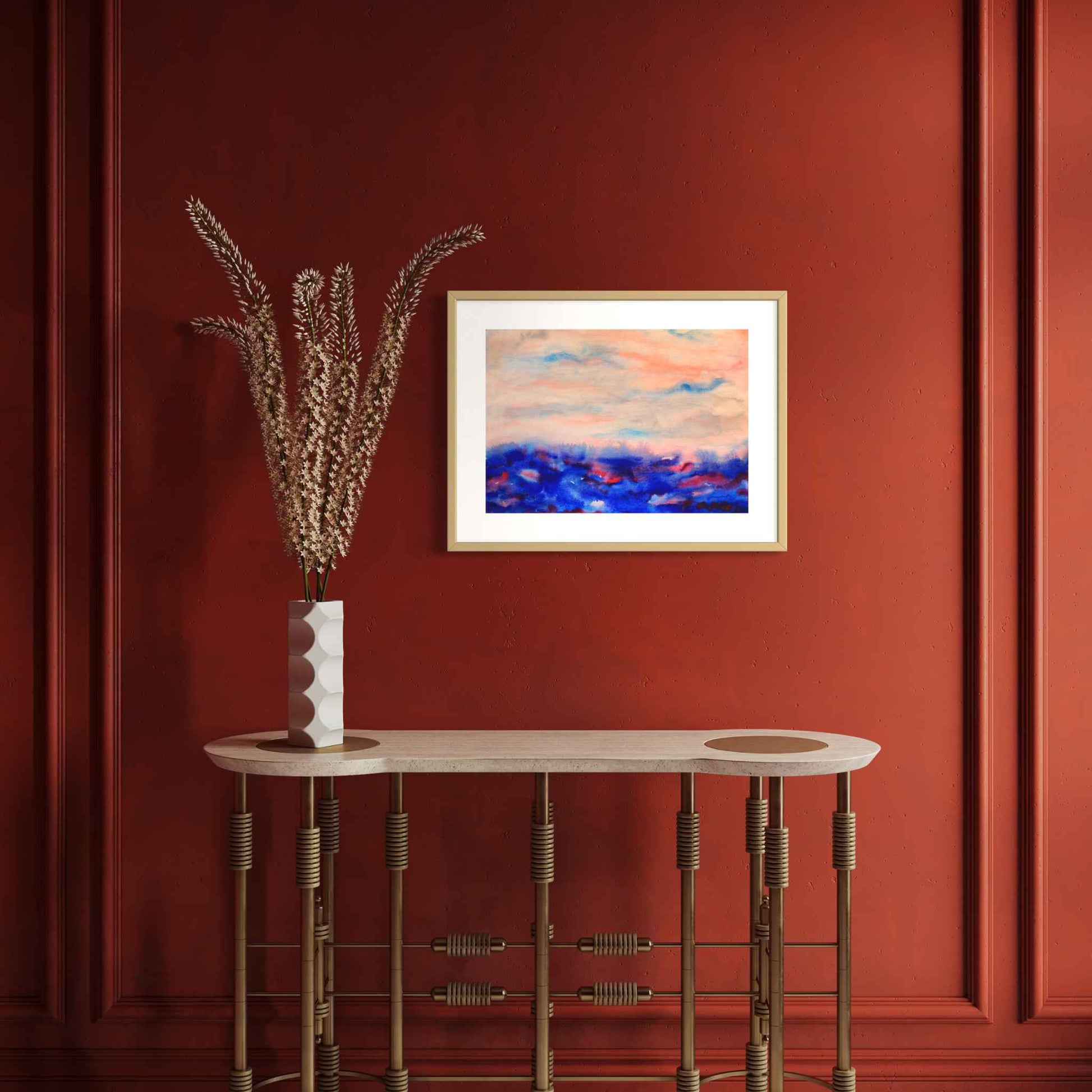 April Morning blue, pink, peach horizon watercolor on rich orange wall above side table with vase
