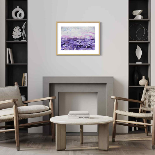 Creation purple pearl gray framed horizon watercolor above mantel, neutral contemporary living room