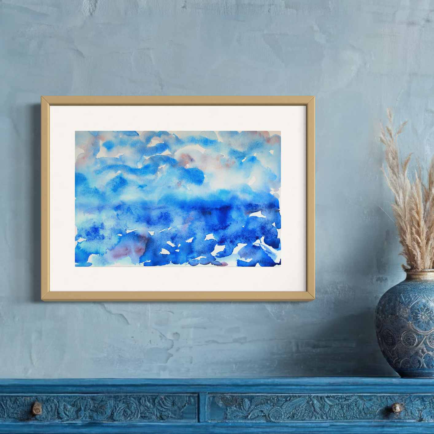 Deep Mystery framed watercolor, blues with red, on light blue wall