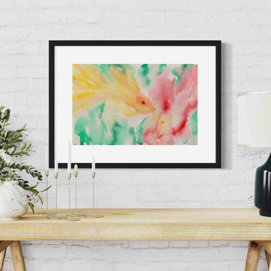 Dreamy yellow fish with red fish framed watercolor painting, closeup view, white wall