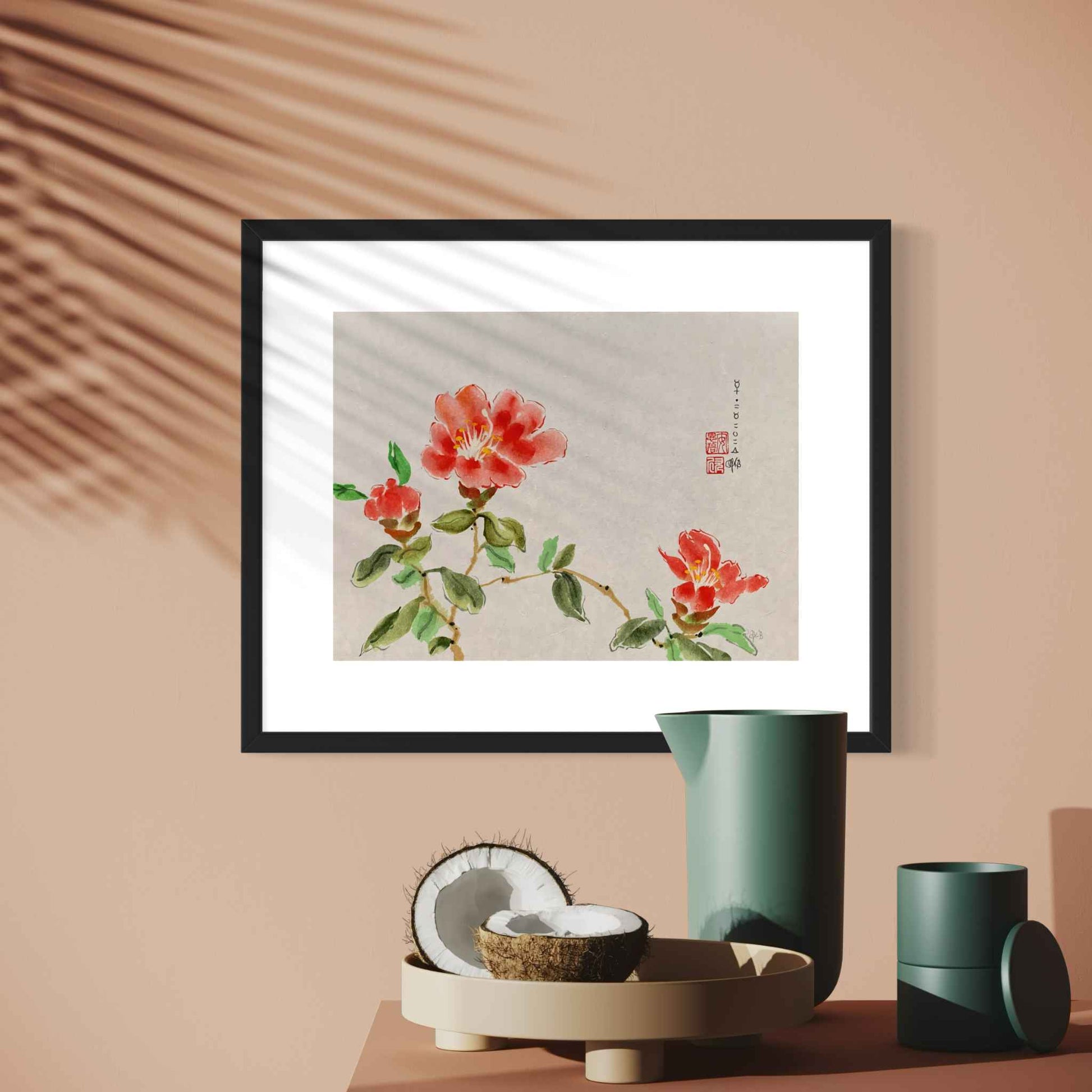 Three red flowers watercolor painting, with black frame, closeup view on sunny wall