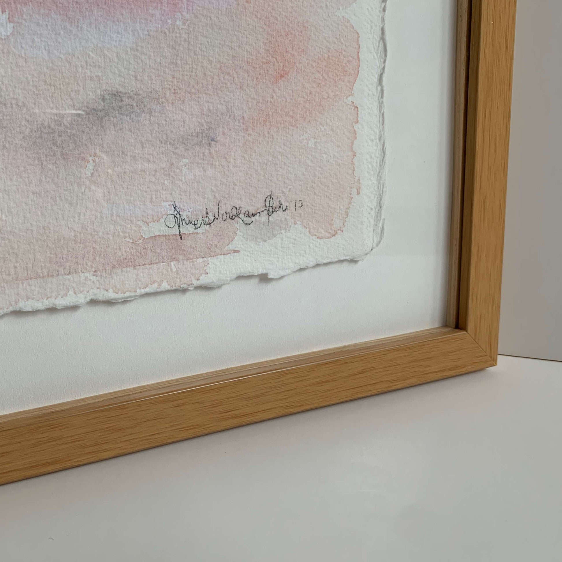 Gentle (Peace) blue, gray, pink horizon watercolor painting closeup, lower right frame corner