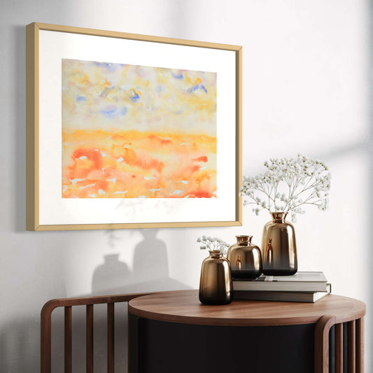Morning Light framed blue, orange, yellow watercolor painting, sunny room above brown table