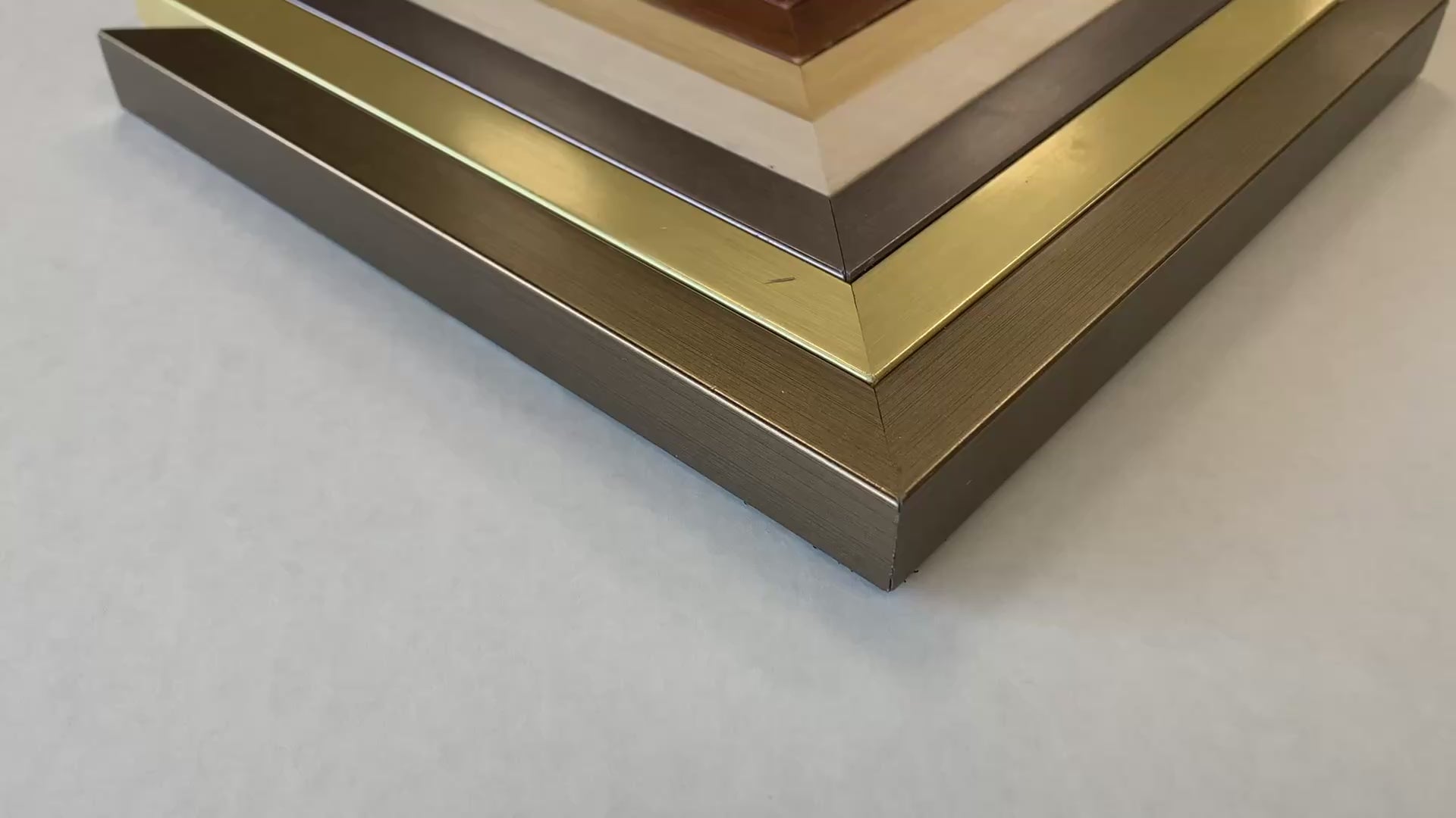 Video of watercolor paintings frames - frame corners placed together, no spaces, in V-shaped view