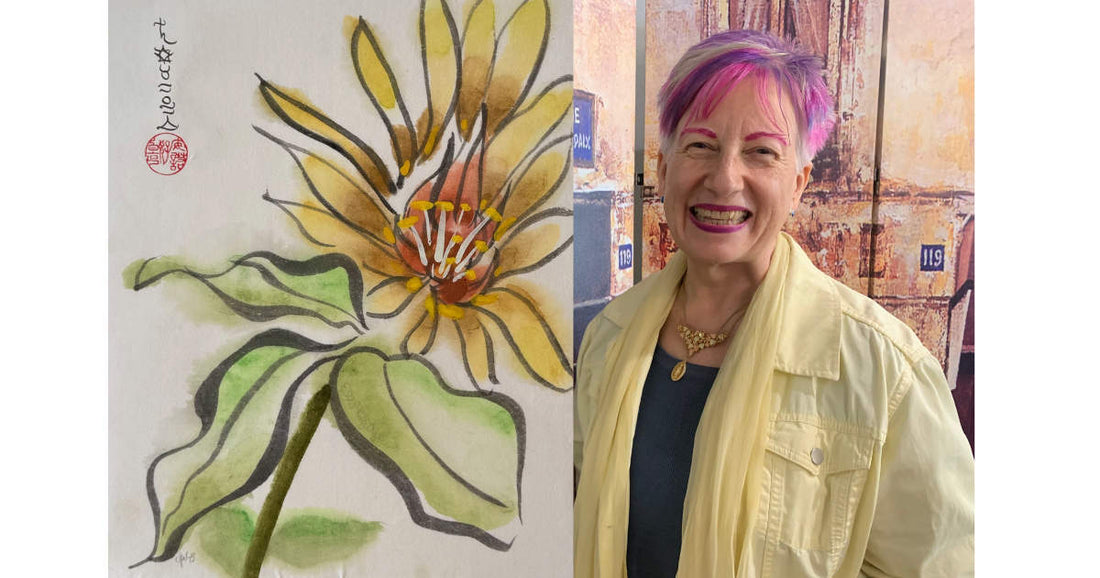 Woman with pink hair standing next to a painting of a yellow flower.