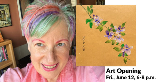 Woman with colorful hair next to a painting of flowers on a gold paper