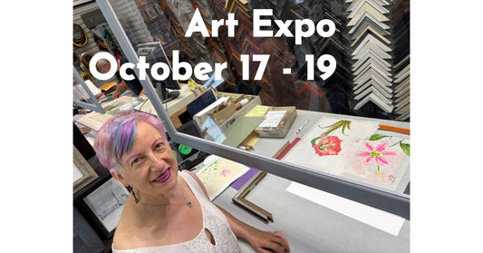 Person with colorful hair at art framer with art supplies and a sign for Art Expo.