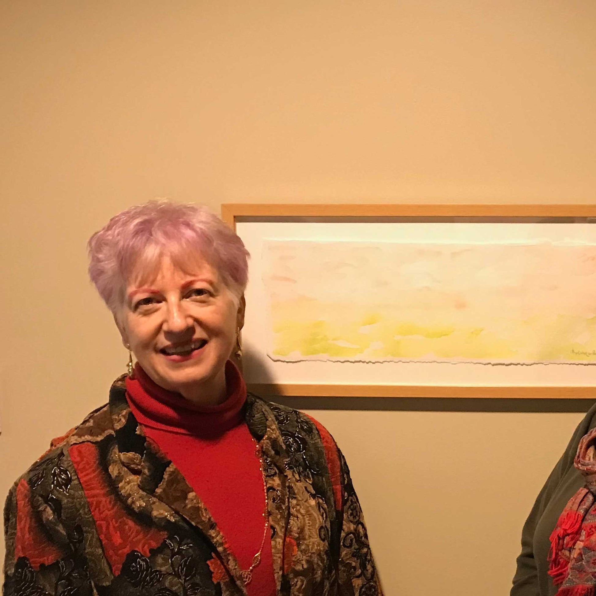 Anne Nordhaus-Bike artist talk, next to Spring Morning pink and green horizon watercolor painting