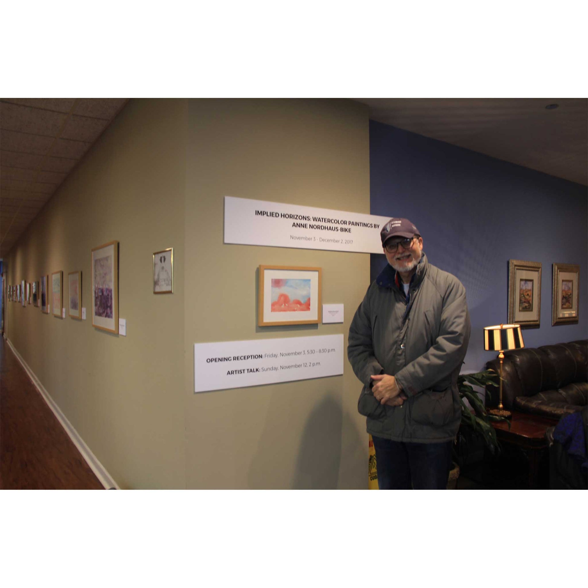 Whimsy red and blue watercolor, William Bike with painting and exhibition signs