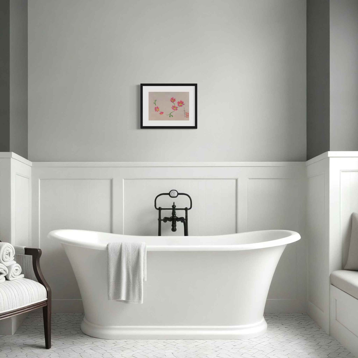 Watercolor painting of five bright pink flowers, framed, in gray bathroom with white tub