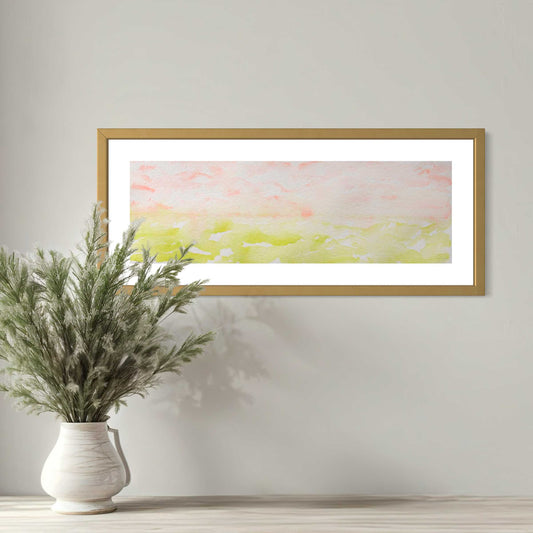 Framed Spring Morning leaf green, pink horizon watercolor above side table with white vase 