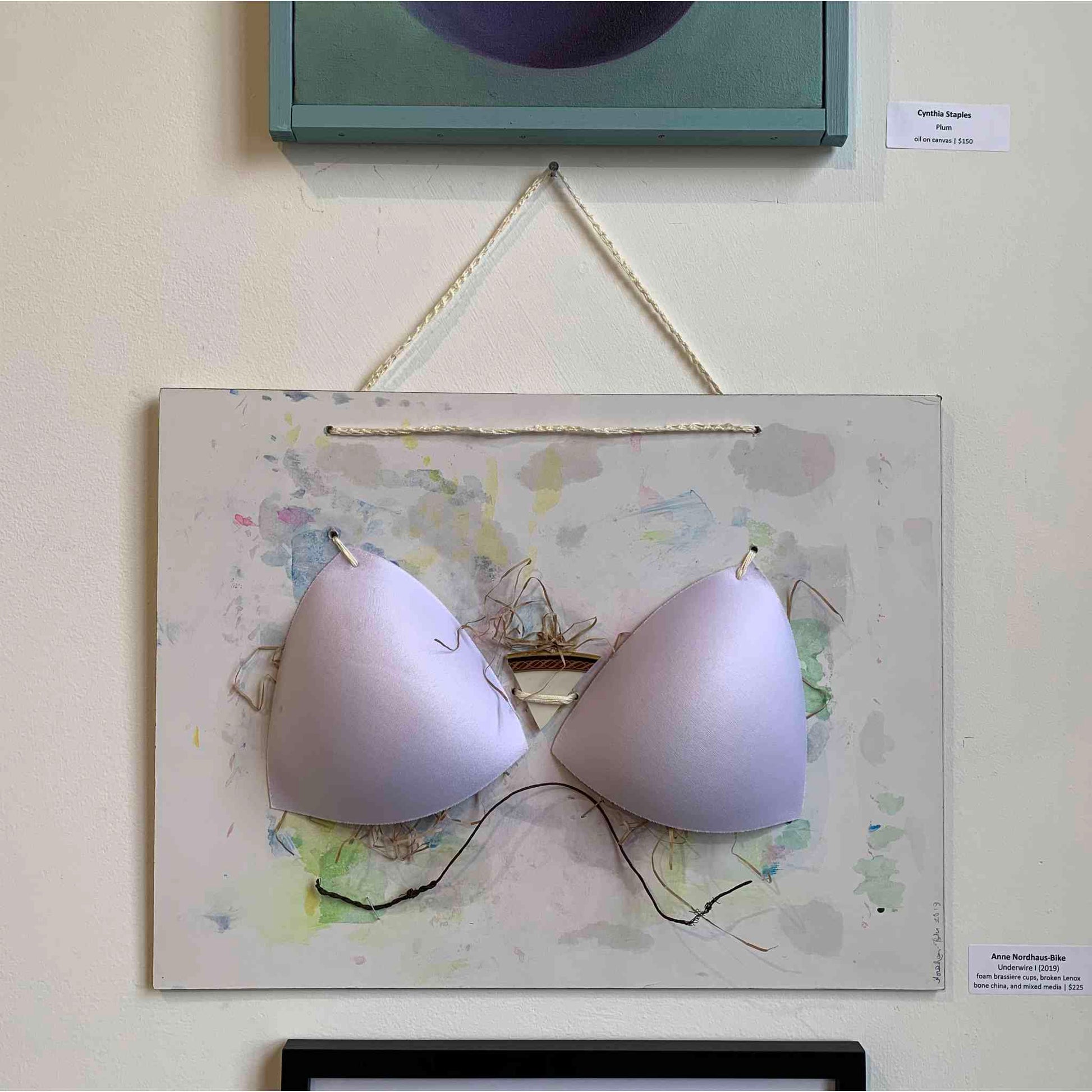 Underwire mixed media bra art by Anne Nordhaus-Bike, installation view, Chicago gallery opening